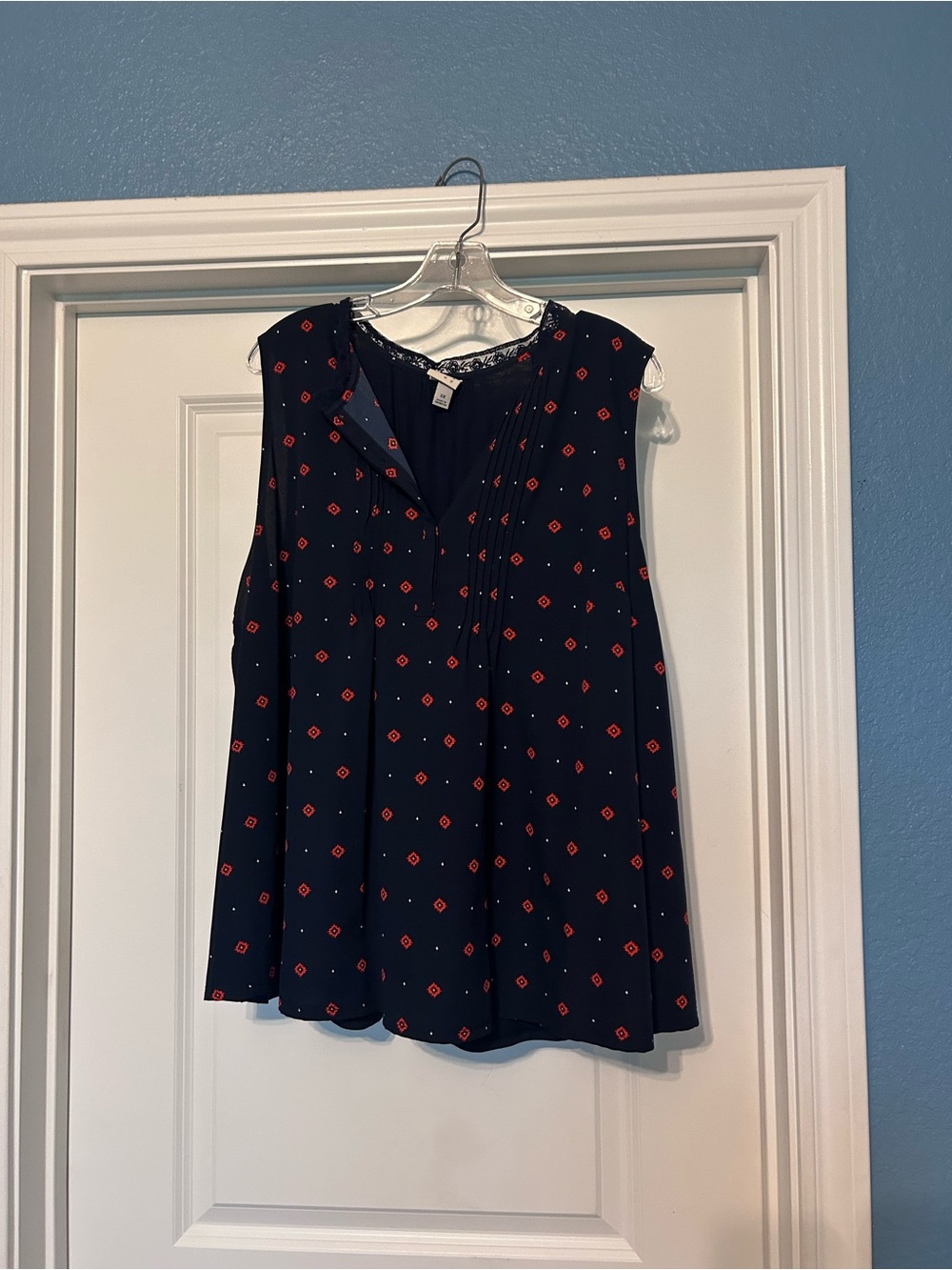 Sleeveless Navy Blouse with Red Geo Print